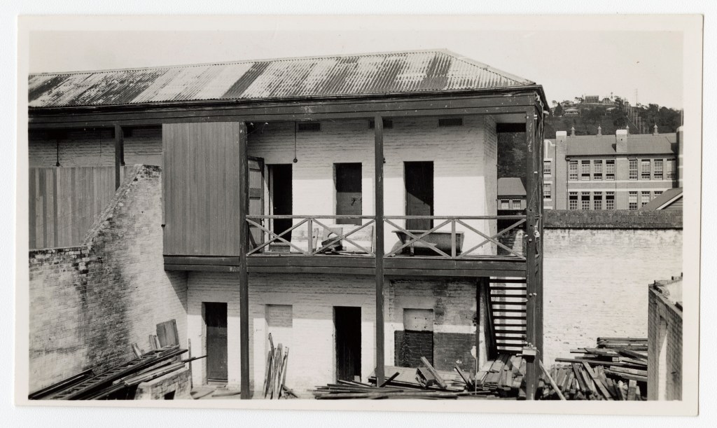 Historic photograph by Spurling showing a cell block in the old Launceston Gaol in a state of disrepair